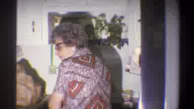 Troy New York USA (1973): Grandma In The Kitchen Washing Her Hands While Talking