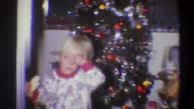 Troy New York USA (1973): Family With Children In Front Of A Decorated Christmas