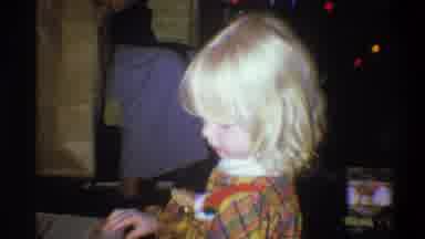 Troy New York USA (1973): Child In Home Around Bag Playing With Box With Collar