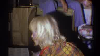 Troy New York USA (1973): A Girl Trying To Unpack The Gift Box And A Boy Dancing