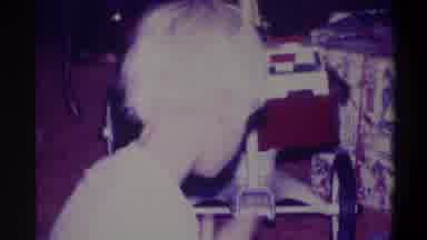 Troy New York USA (1973): Blonde Headed Child Playing With Eyes And Looking At