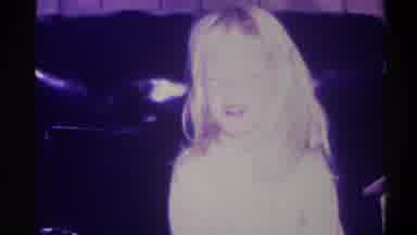 Troy New York USA (1973): Small Young Blonde Girl Touches Her Head And Is Talking