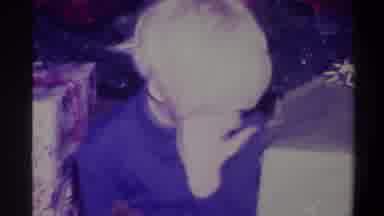 Troy New York USA (1973): Little Boy Hiding His Face While Sitting Near Christmas