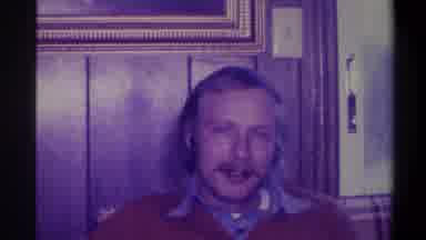 Troy New York USA (1973): A Man In A Red Sweater Talks To An Old Woman