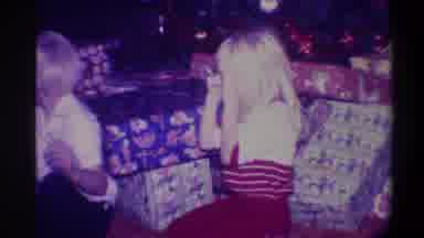 Troy New York USA (1973): Little Boy Picking Out Christmas Present Around