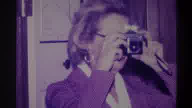 Troy New York USA (1973): An Old Woman Taking Photograph Of Another One Standing