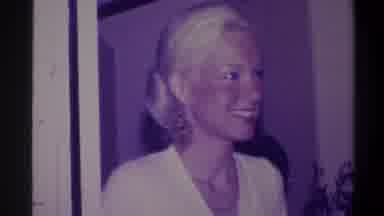 Troy New York USA (1973): A Lady Smiling It Is An Older Film She Is Wearing Large
