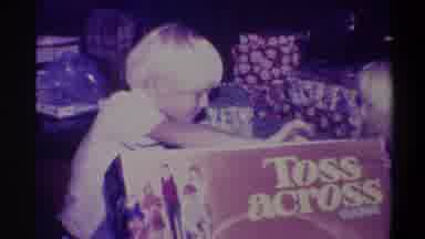Troy New York USA (1973): Two Small Children Open Some Of Their Gifts On Christmas