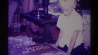 Troy New York USA (1973): Young Boy Trying To Open A Gift!