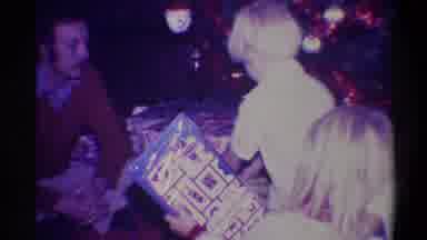 Troy New York USA (1973): Christmas Scene Children Getting Presents As Family