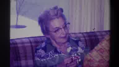 Troy New York USA (1973): Old Lady Presents A Child Who Is Anxious To Open The