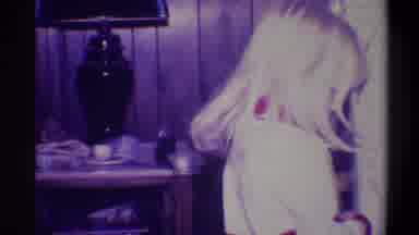 Troy New York USA (1973): A Family Gathers At Christmas Time To Open Some Gifts