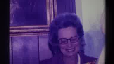 Troy New York USA (1973): Mother In Glasses And Red Lipstick Taking Care Of Her