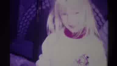 Troy New York USA (1973): Little Smiling Girl Opening Up A Christmas Gift With