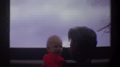 Gainsville Florida USA (1974): Grandmother With Kissing A Blond-Haired Child And