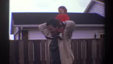 Gainsville Florida USA (1974): Child Rides On Fathers Back Before Being Flipped