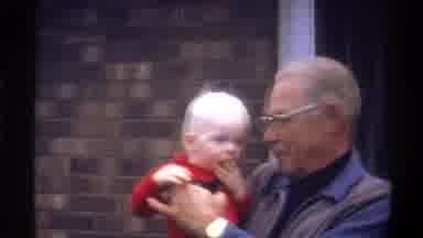Gainsville Florida USA (1974): Grandpa Making His Grandson Wave