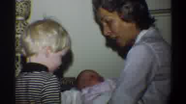 Gainsville Florida USA (1974): Boy And Mother Looking At Newborn Baby And Father