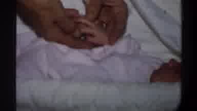 Gainsville Florida USA (1974): New Born Baby Holding Father Hand Touching Moment