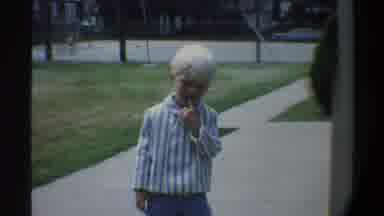 Gainsville Florida USA (1974): White Kid Standing Sidewalk Woman Man Converse