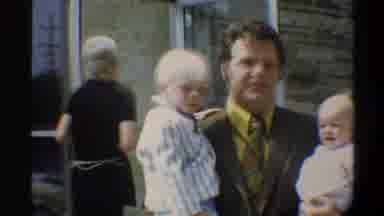 Gainsville Florida USA (1974): One Guy Laughing The Other Guy With Two Kids On His