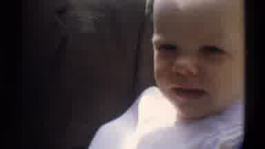 Gainsville Florida USA (1974): Small Baby Who Is Tired Of Socializing In White