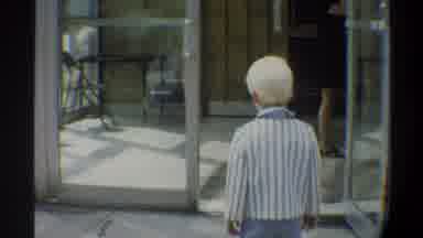 Gainsville Florida USA (1974): Small Child Looking Around While Outside Of