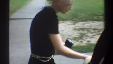 Gainsville Florida USA (1974): A Child Playing In The Presence Of His Mother And