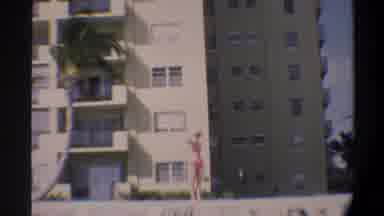 Gainsville Florida USA (1974): Pink Bikini Brown Apartment Windows Tree Bushes