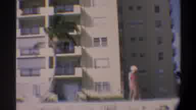 GAINSVILLE FLORIDA USA-1974: Woman Walking On The Beach