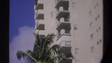 Gainsville Florida USA (1974): Woman And Child Walking In Water By Hotel