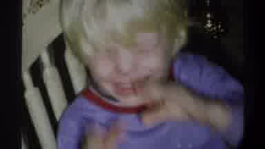 Gainsville Florida USA (1974): A Child Playing With His Grandma