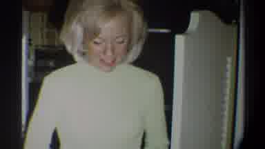 Gainsville Florida USA (1974): Old Film Of 1950s Lady Walking Around In Kitchen Of