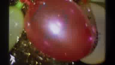 Gainsville Florida USA (1974): Balloons And A Child Holding Up Four Fingers To The