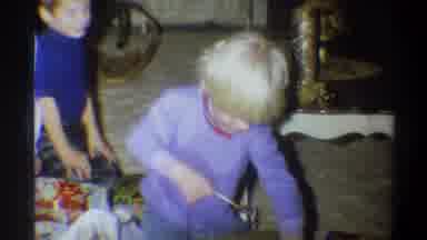 Gainsville Florida USA (1974): Kids Opening Gift Boxes