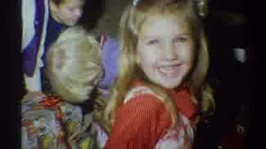 Gainsville Florida USA (1974): Children Opening Holiday Presents Toys Parents