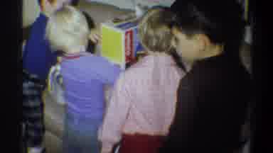 Gainsville Florida USA (1974): A Group Of Kids Unpacking Presents And Fighting Off