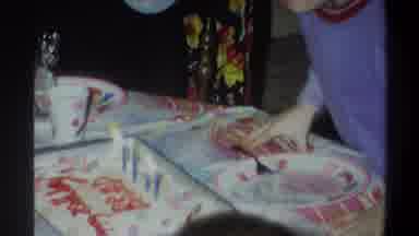 Gainsville Florida USA (1974): Birthday Boy Blowing Out Birthday Cake Candles