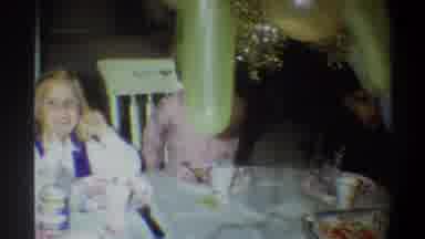 Gainsville Florida USA (1974): Children Are Seated Around A Table Filled With