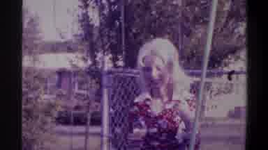 Gainsville Florida USA (1974): A Women Swinging In The Swing In The Park Enjoyably