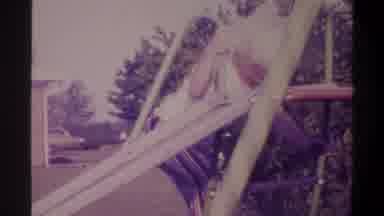 Gainsville Florida USA (1974): Two Children Climbing On Playground Equipment One