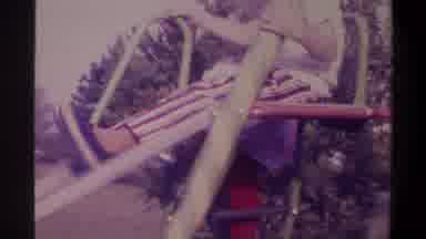 Gainsville Florida USA (1974): Two Young Children Climbing And Sliding Down Metal