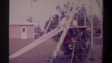 Gainsville Florida USA (1974): Child At Play On Slide And Seesaw Equipment In