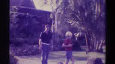 Gainsville Florida USA (1974): Father Playing With His Son On The Grass With His