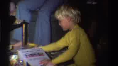 Gainsville Florida USA (1975): Excited Kids In The 90s Opening Presents On