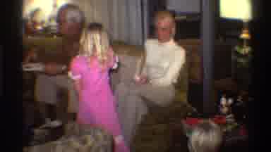 Gainsville Florida USA (1975): A Family On Holiday With Child Between Parents