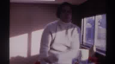 Gainsville Florida USA (1975): Overweight Man Adjusts Fit Of White Turtleneck