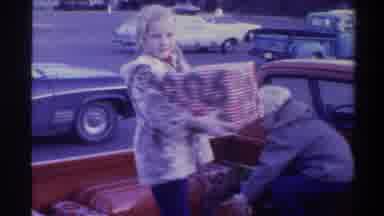 Gainsville Florida USA (1975): Two Young Children Standing In Back Of Red Truck