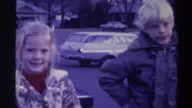 Gainsville Florida USA (1975): The Blond Sister And Brother Both Attempt To Smile