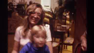 Gainsville Florida USA (1975): People Gathering Around With Kids Who Are Opening